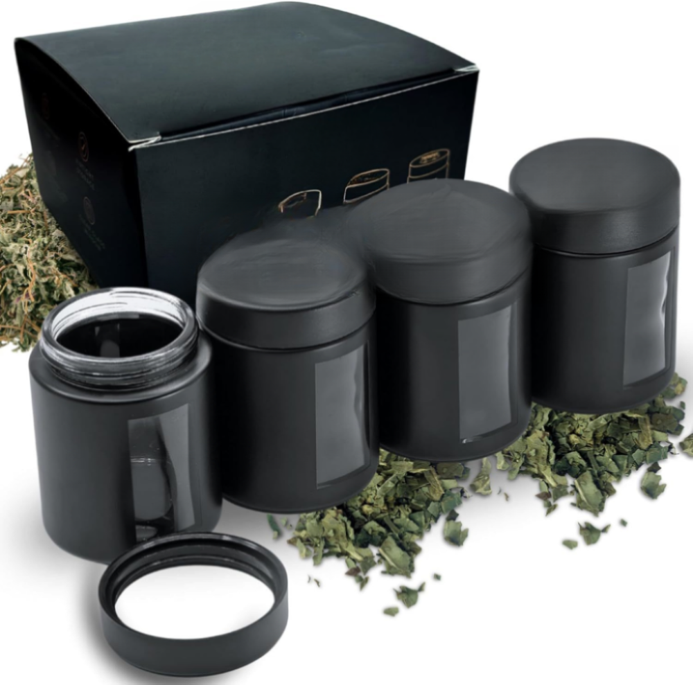 1 ounce V2 flush mount, child-resistant packaging, transparent glass base, cylindrical design.