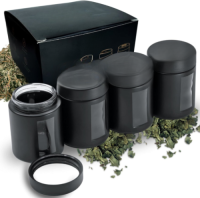 1 ounce V2 flush mount, child-resistant packaging, transparent glass base, cylindrical design.