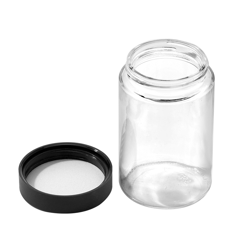 5 ounce V2 flush mount, child-resistant packaging, transparent glass base, cylindrical design.