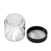 3 ounce V2 flush mount, child-resistant packaging, transparent glass base, cylindrical design.