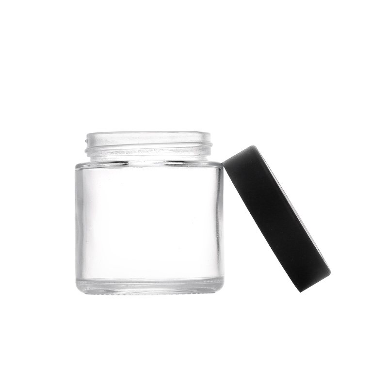 3 ounce V2 flush mount, child-resistant packaging, transparent glass base, cylindrical design.