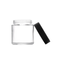 3 ounce V2 flush mount, child-resistant packaging, transparent glass base, cylindrical design.