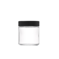 3 ounce V2 flush mount, child-resistant packaging, transparent glass base, cylindrical design.